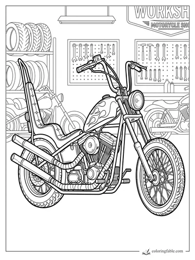 Custom chopper motorcycle with flame tank, tall seat, tool boards, tires, and workshop sign