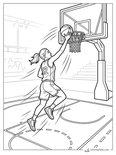 Girl in jersey 12 jumping for a layup on an indoor basketball court