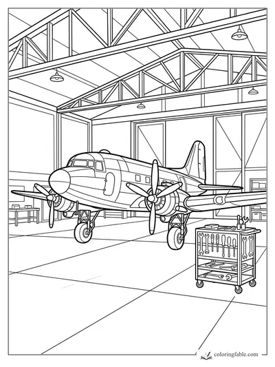 Vintage twin-prop airplane inside a hangar with tool cart, workbenches, ceiling trusses, and lights